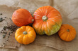 Decorative pumpkins on burlap