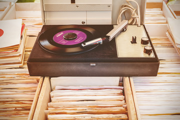 Wall Mural - Old record player on top of used vinyl lp records