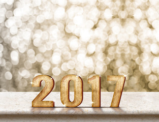 Poster - Happy New Year 2017 wood texture on marble table with sparkling