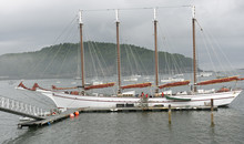 Four Masted Schooner In A Foggy Setting