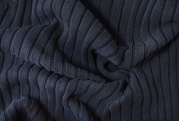 Poster - A full page of navy blue knitwear fabric background texture