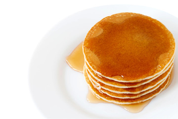 Wall Mural - Pancakes with maple syrup isolated on a white background. Breakfast, Dessert.