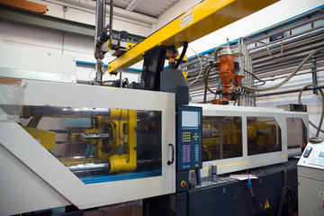 Injection molding machines in a large factory