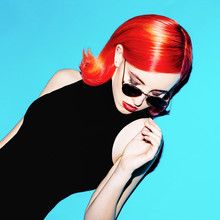 Elegant Lady With Red Hair And Stylish Sunglasses. Retro Mood
