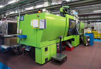 Injection molding machines in a large factory