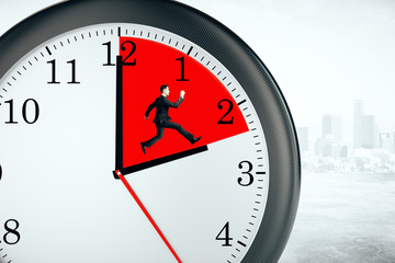 Businessman inside clock, deadline concept