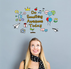 Wall Mural - Do Something Awesome Today concept with happy young woman