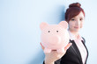 © ryanking999 - woman take pink piggy bank