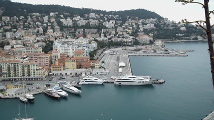Aufkleber - City view with beautiful landscape. Breathtaking nature with huge mountains. Sea in the town. boats and yachts on the wharf. Pier in azure sea in spring season.