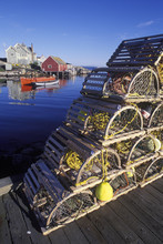 Canada, Nova Scotia, Peggy's Cove,  Lobster Traps And Boats In Cove