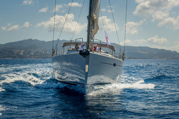 Wall Mural - View on the bow of sailing yacht wich is cruising near Porto Cervo, Sardinia.