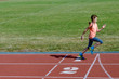 © Iuliia Sokolovska - Kids sport, child running on stadium track, training and fitness concept