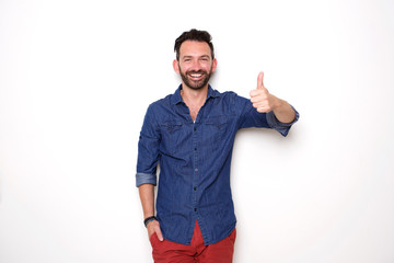 Wall Mural - Confident mature man showing thumbs up