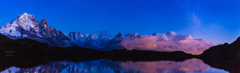 Fototapete - Dusk over the Mont Blanc mountainrange and Lac De Chéserys, Chamonix, France.