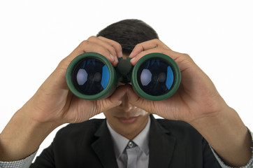 Businessman with binoculars