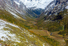 Landscape Mountains With Blue River And White Snow In Autumn