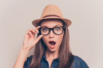 Sticker - Shocked pretty woman in hat and glasses with open mouth