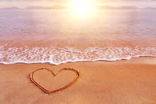 Amazing Sea Sunrise View With A Hand Drawn Heart As Love Symbol