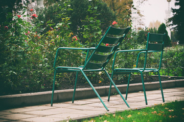 metal chairs in the garden, a seating area in the garden