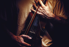 Holding An Old Violin