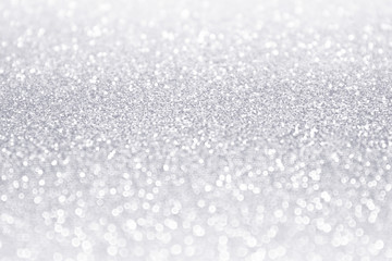 elegant white and silver glitter sparkle confetti background or party invitation