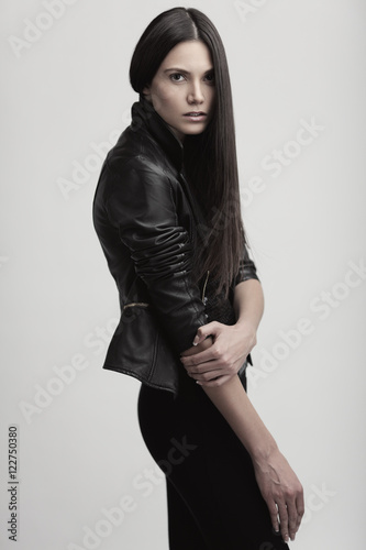 Fashion Studio Shot Of Young And Sensual Model In Leather Jacket