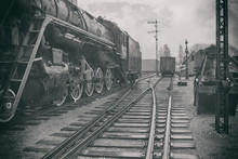 The Stylized Image Of An Old Steam Locomotive At The Station