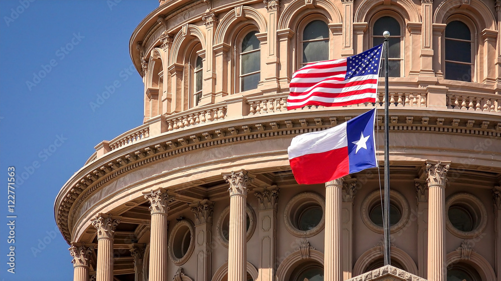 American and Texas state flags flying on the dome of the Texas State Capitol building in Austin - obrazy, fototapety, plakaty 