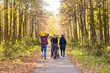 © satura_ - Family On Walk In Countryside