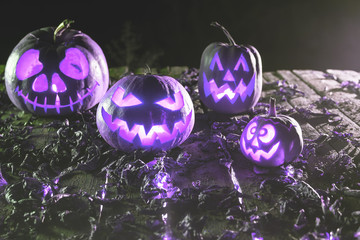 Poster - Halloween pumpkins at wood background. Carved scary faces of pumpkin.