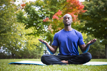 young man exercising yoga