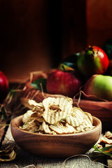 Wall Mural - Healthy food: apple chips and fresh apples, decorations in the r