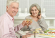 © aletia2011 - happy senior couple with champagne