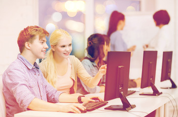 Wall Mural - students with computer monitor at school