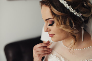 Charming bride in her wedding day