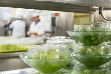 Wall Mural - Salads Prepped with Chefs in Background