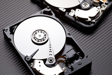 Two Hard Disk Drive On Carbon Background