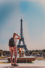  young woman shares the enthusiasm of the visits Eiffel tower in