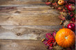 Thanksgiving  or fall greeting background with pumpkins and fall