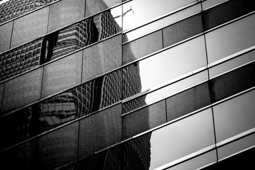 windows of business building in Hong Kong with B&W color