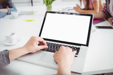 Poster - High angle view of executive using laptop at office