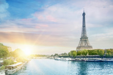 Romantic Sunset Background. Eiffel Tower With Boats On Seine River In Paris, France.