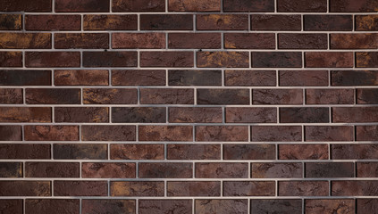 Brick brown wall. The rich texture