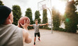 © Jacob Lund - Streetball players on court playing basketball