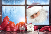 Santa Claus And Window 