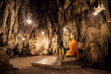 Wall Mural - The old ancient buddha statue in cave at Wat Tham Khao Pun, Kanchanaburi Province, Thailand.