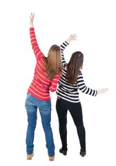 Sticker - Back view of two young  brunette standing woman  l . beautiful girl friends  discuss. Rear view people collection.  backside view of person.  Isolated over white background. Two girls at a concert