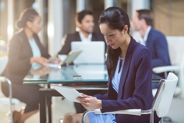 Poster - Businesswoman using digital tablet