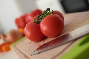 Tomatoes close-up with knife