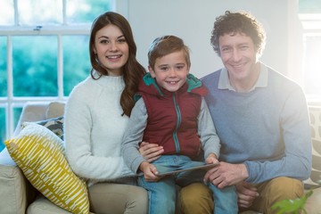Poster - Happy family using digital tablet
